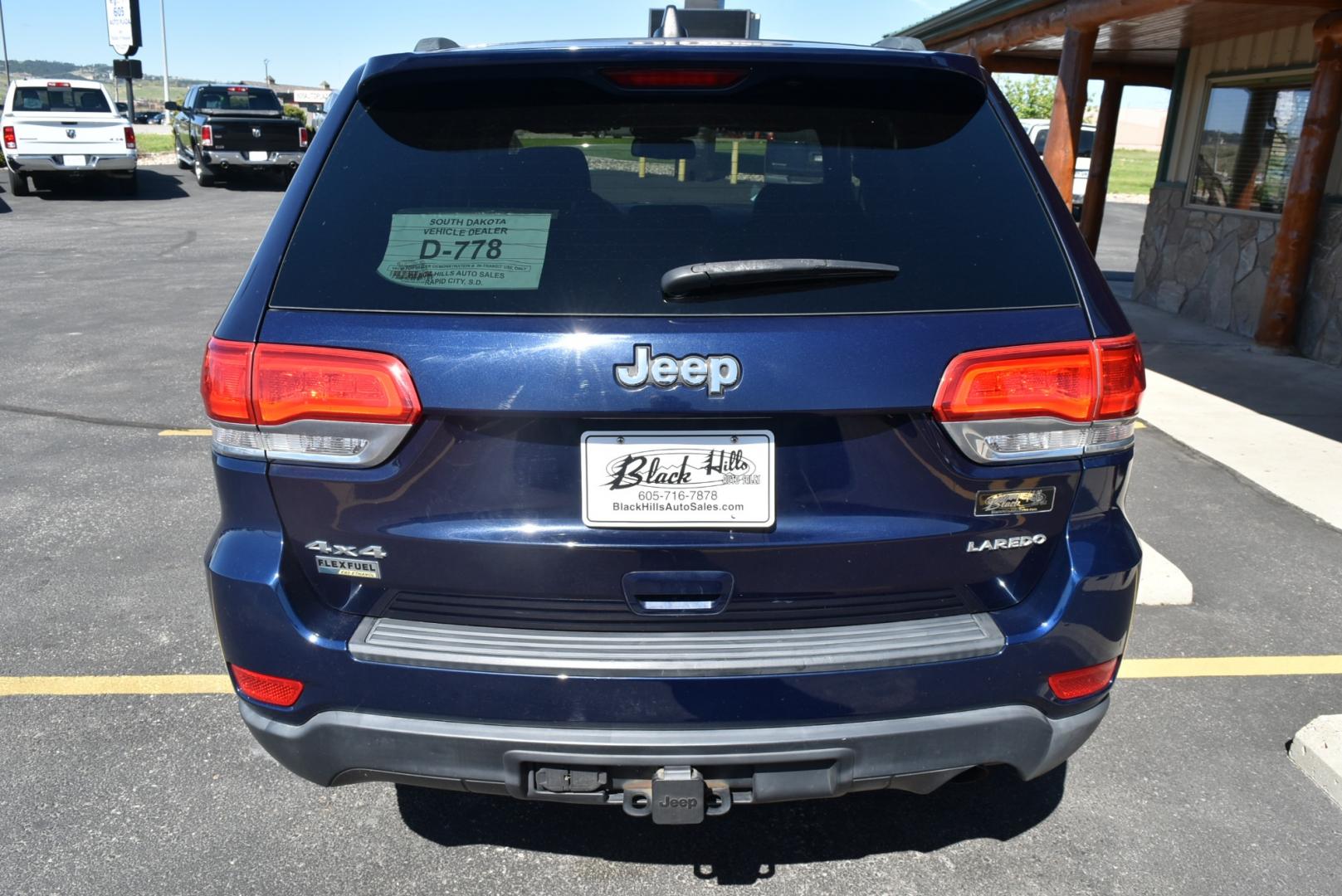 2014 Blue /Black Jeep Grand Cherokee Laredo (1C4RJFAG6EC) with an 3.6L V6 24 Valve VVT engine, 8-Speed Automatic transmission, located at 1600 E Hwy 44, Rapid City, SD, 57703, (605) 716-7878, 44.070232, -103.171410 - Photo#6